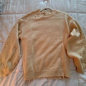 Elegant Cream Sweater with Pearl Accents